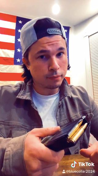 A screengrab from Jinno's TikTok account, featuring him loading a rifle magazine with bullets